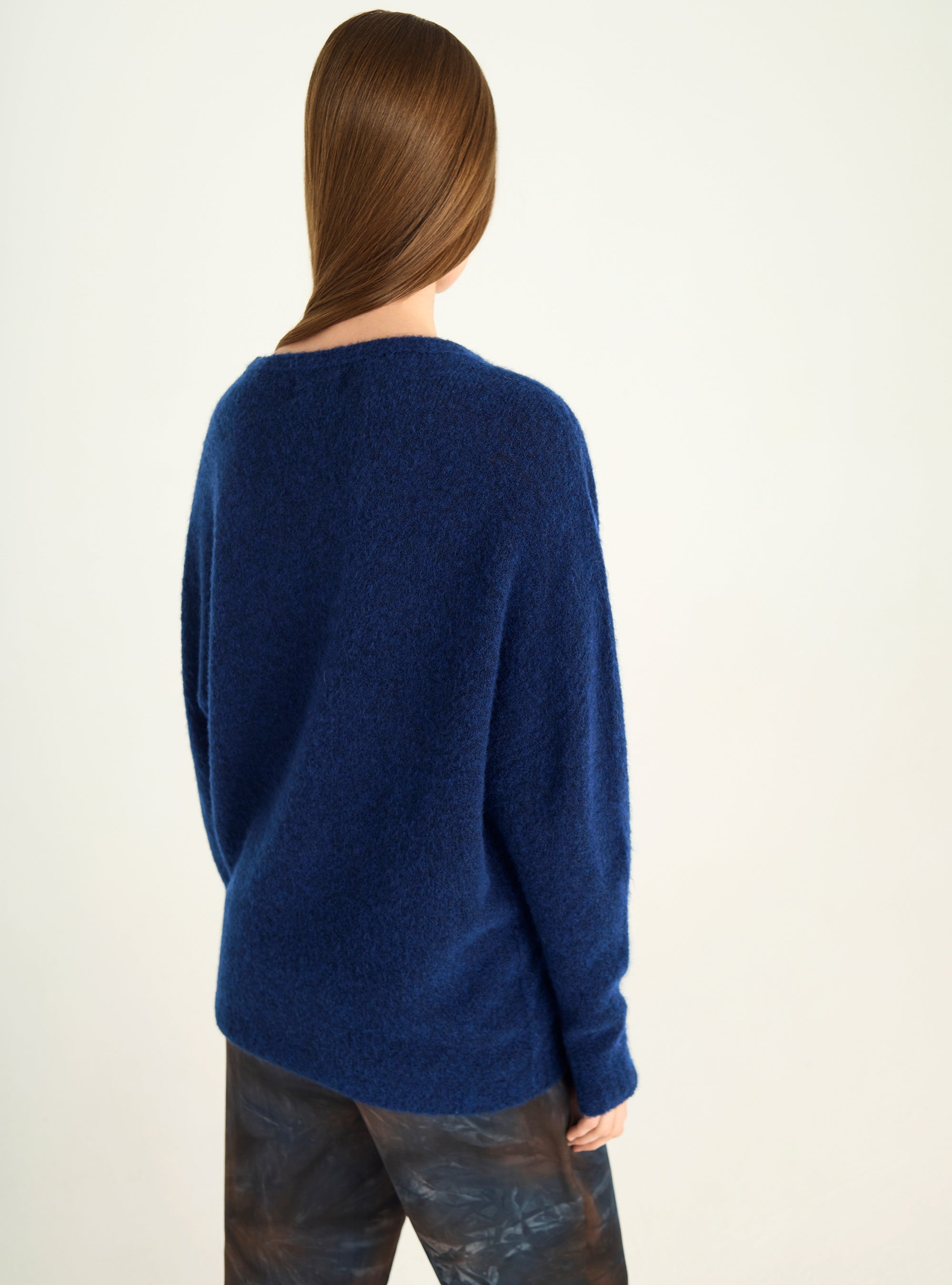 Loose sweater in natural wool