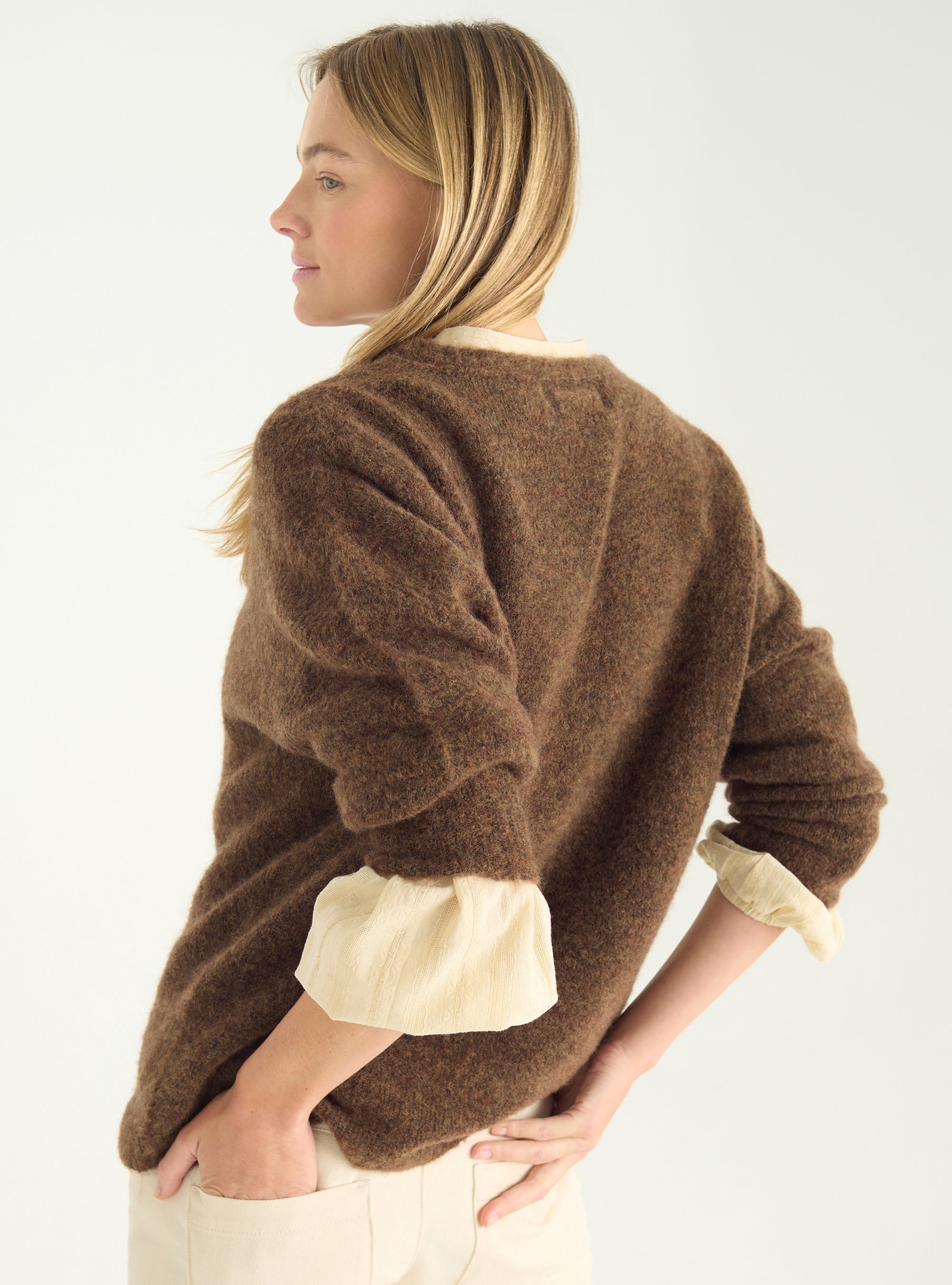 Loose sweater in natural wool