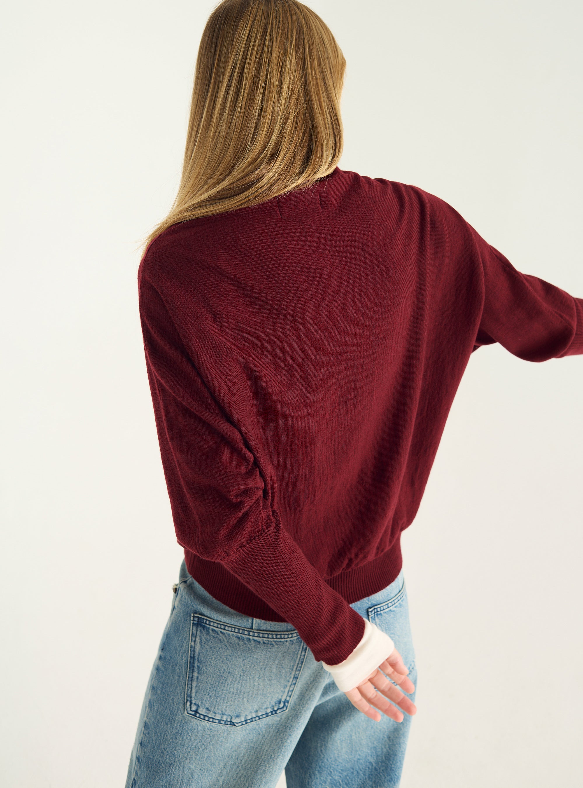 Oversized sweater with draped collar