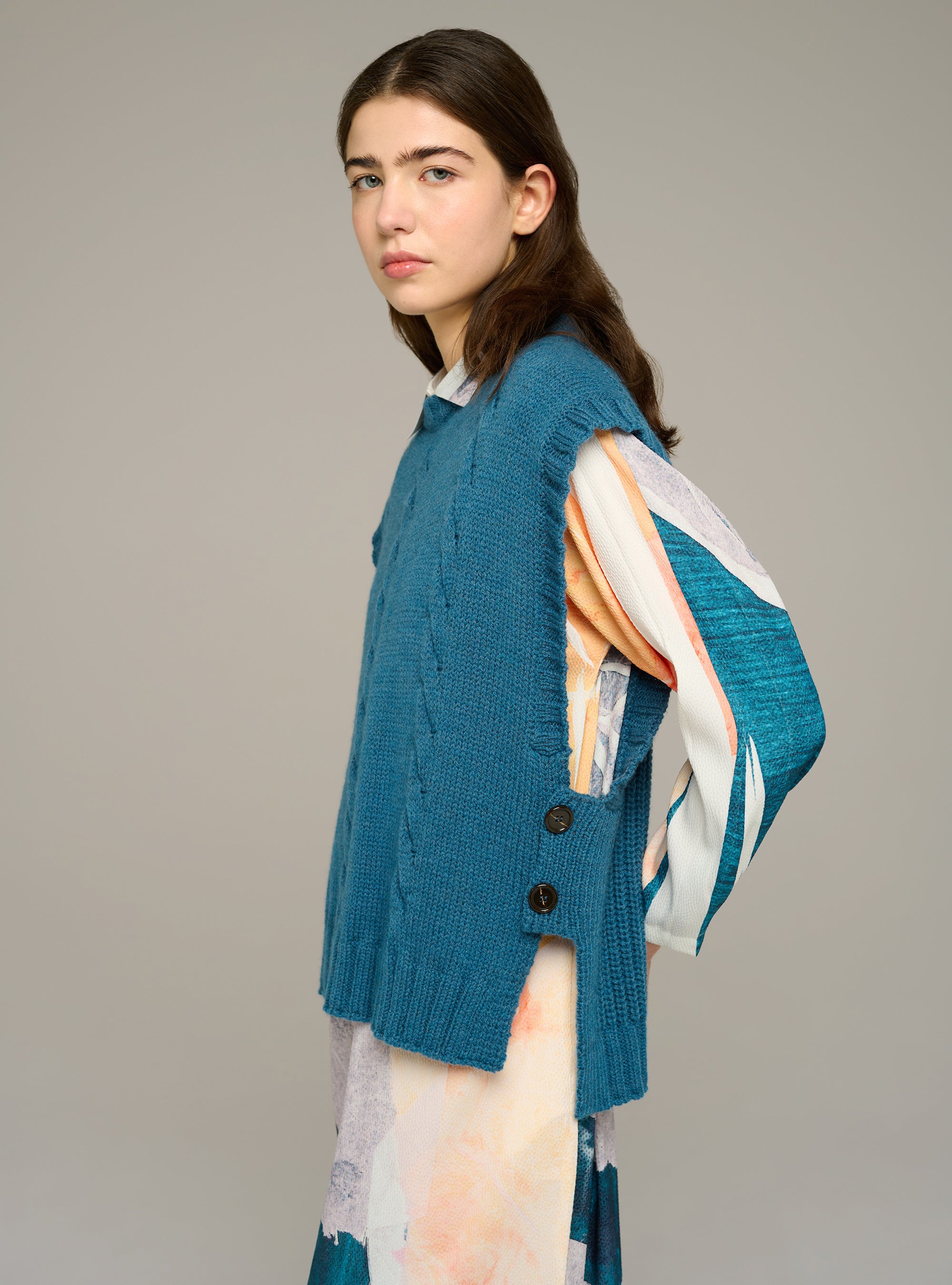 Sleeveless cable-knit sweater