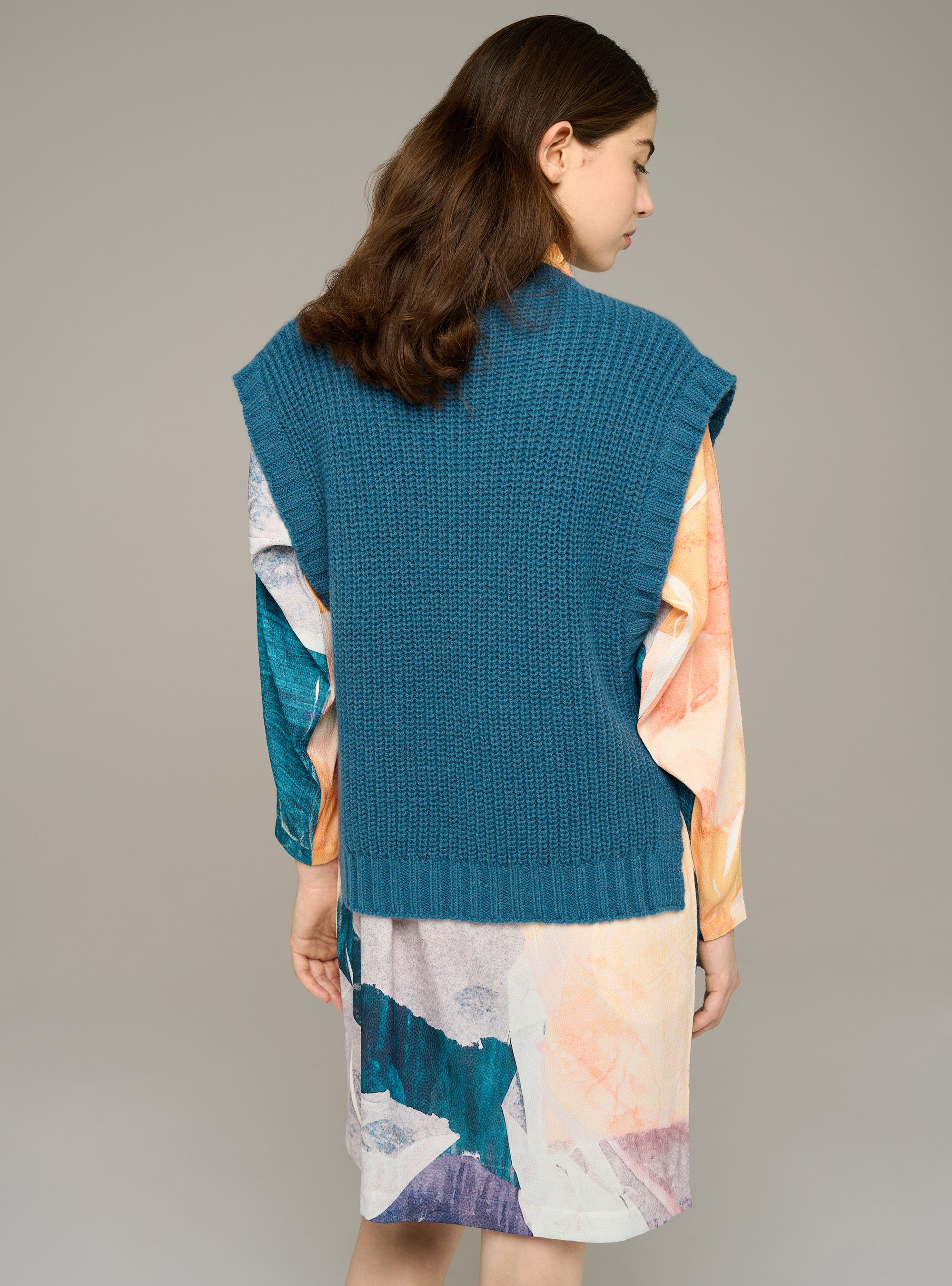 Sleeveless cable-knit sweater