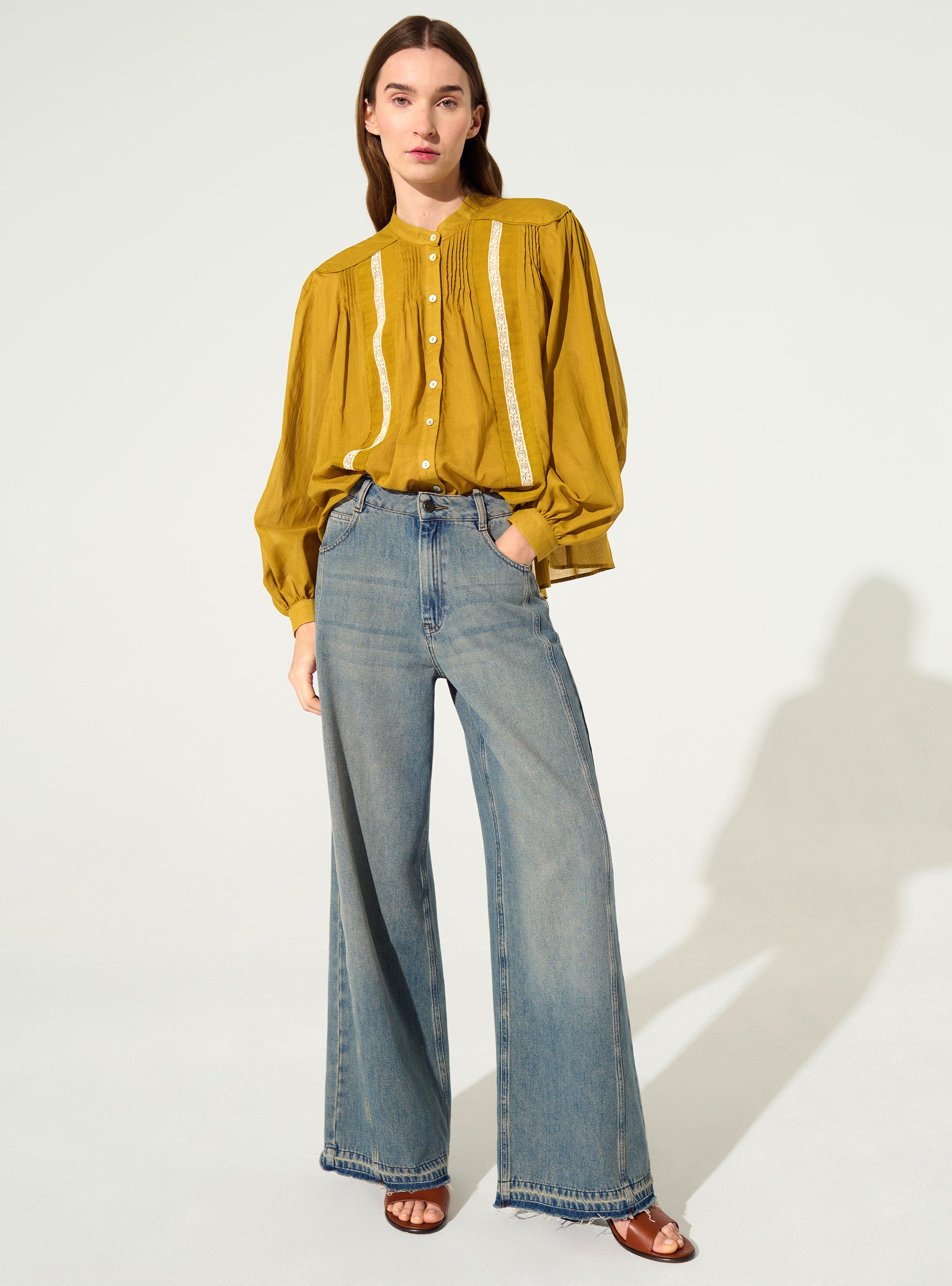 Oversized pleated shirt and Calais-Caudry® lace yellow ochre
