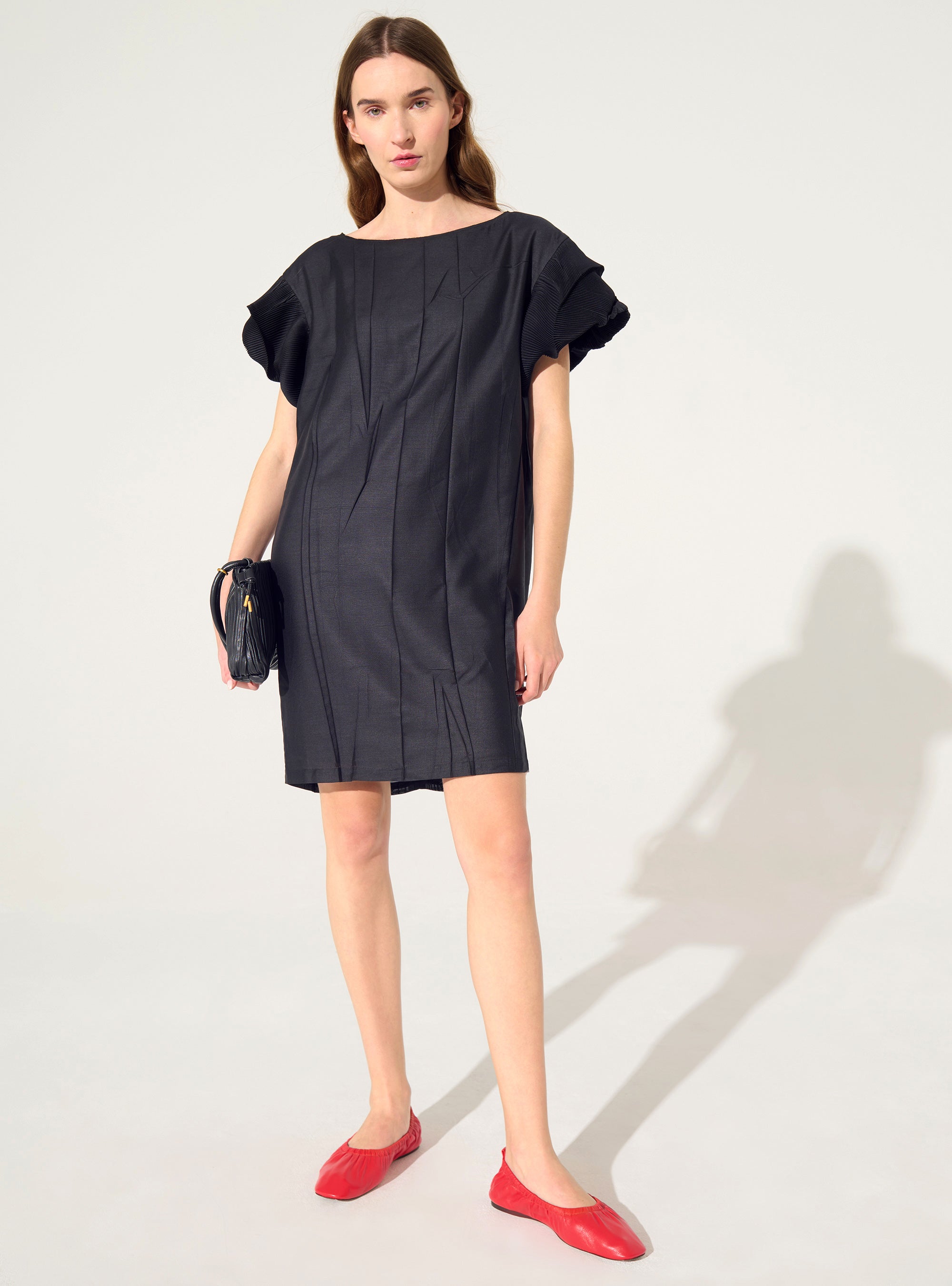 Straight black pleated dress