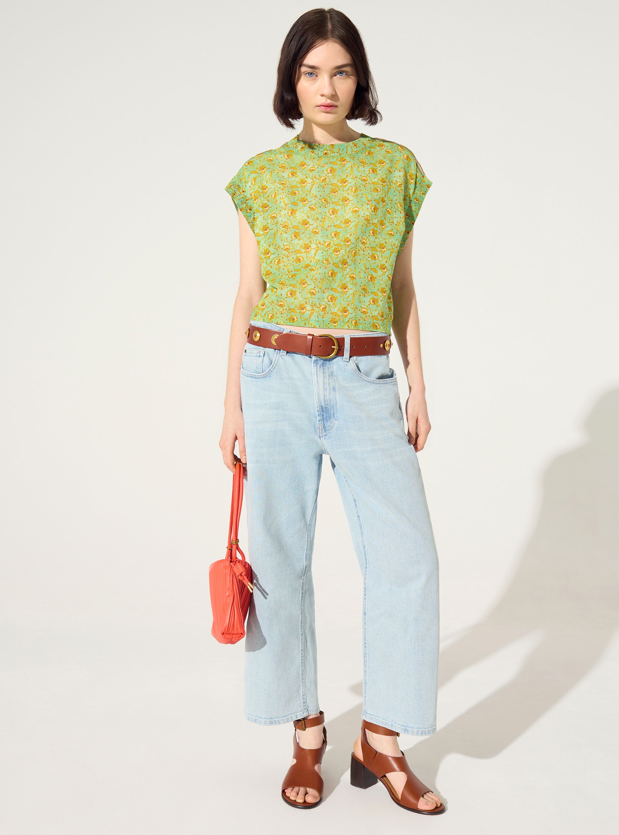 Fitted pleated blouse printed in green cotton