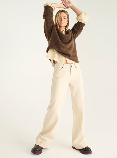 Loose sweater in natural wool