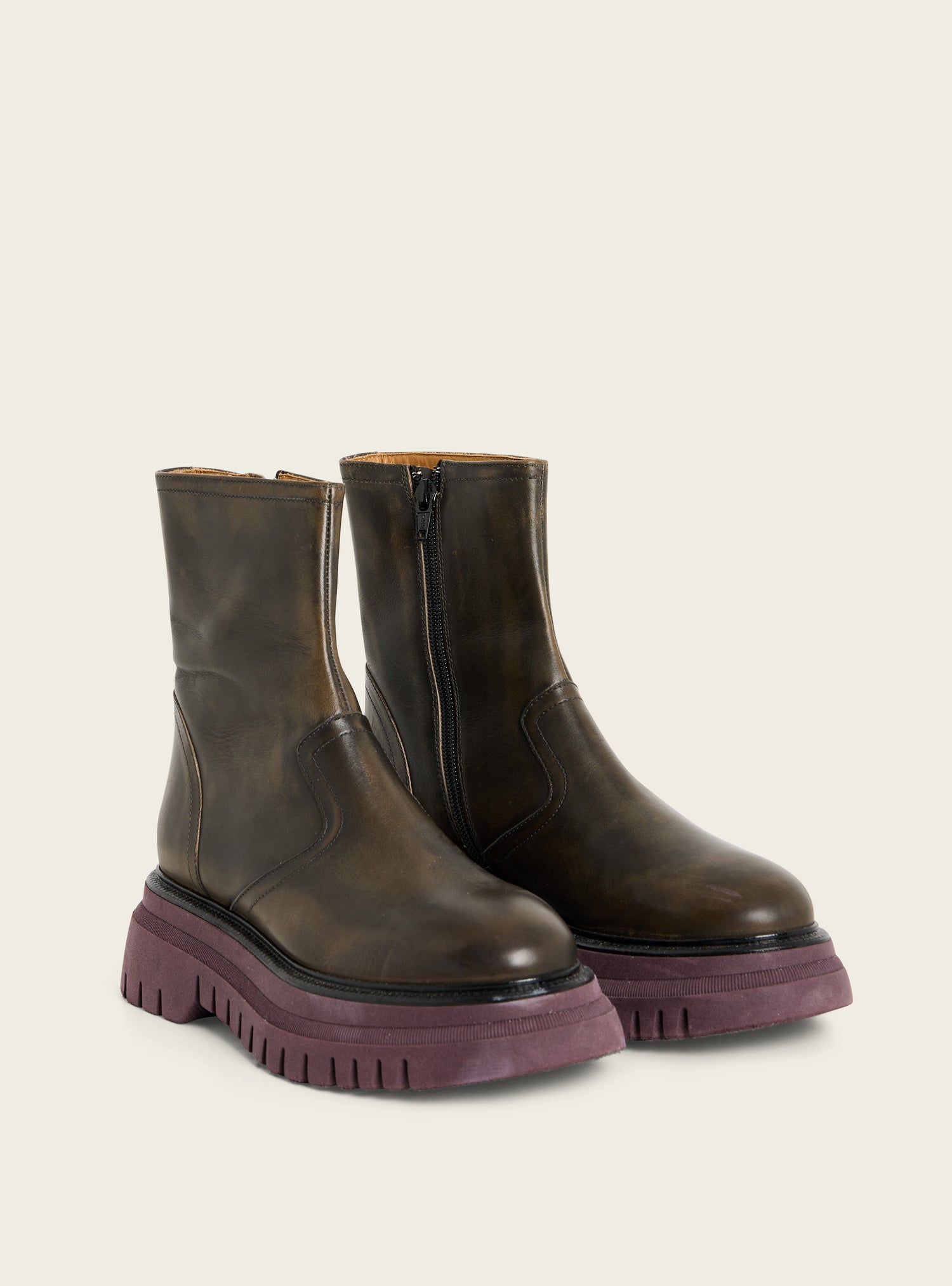 Black patinated leather ankle boots