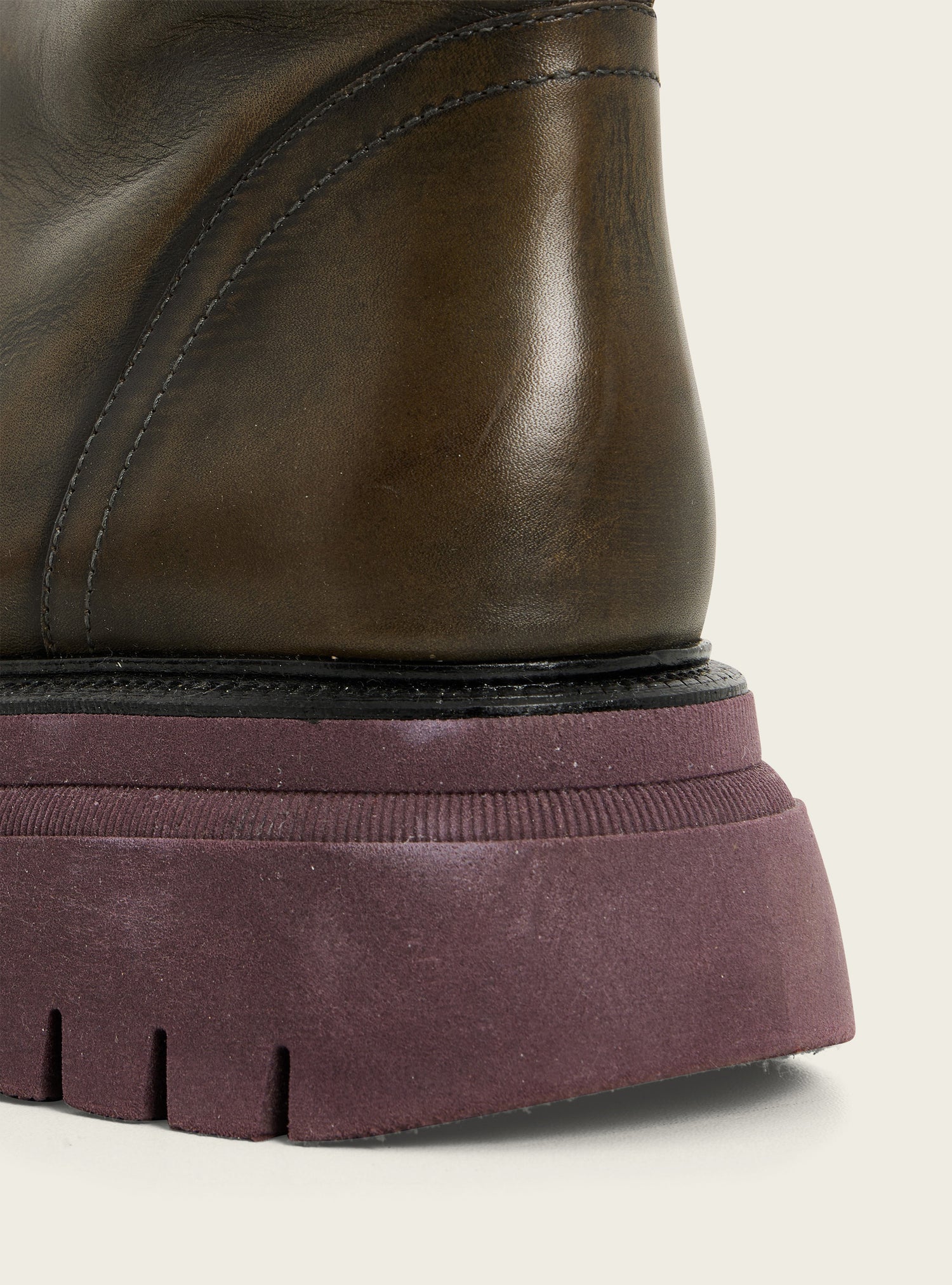 Black patinated leather ankle boots