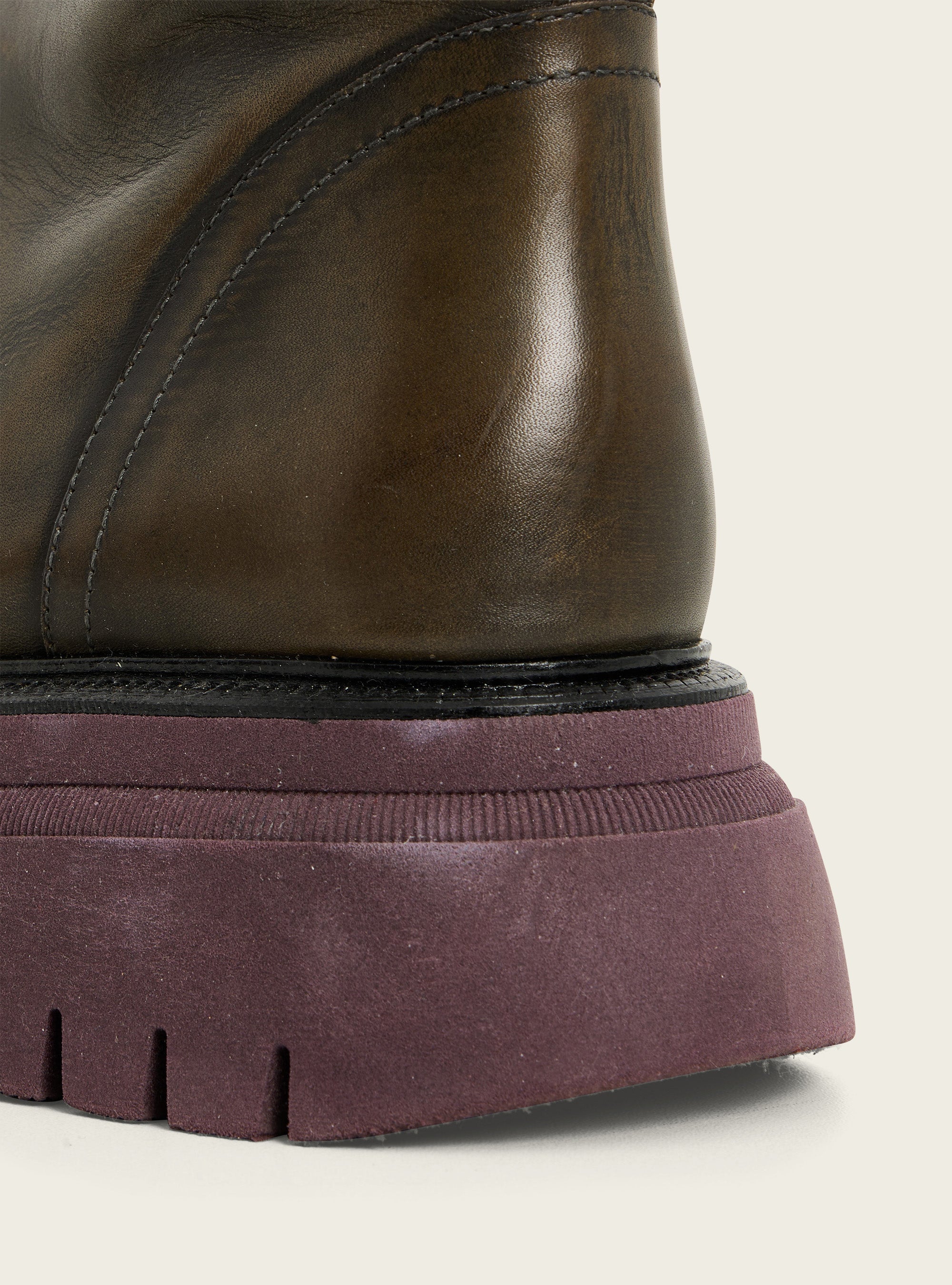 Black patinated leather ankle boots