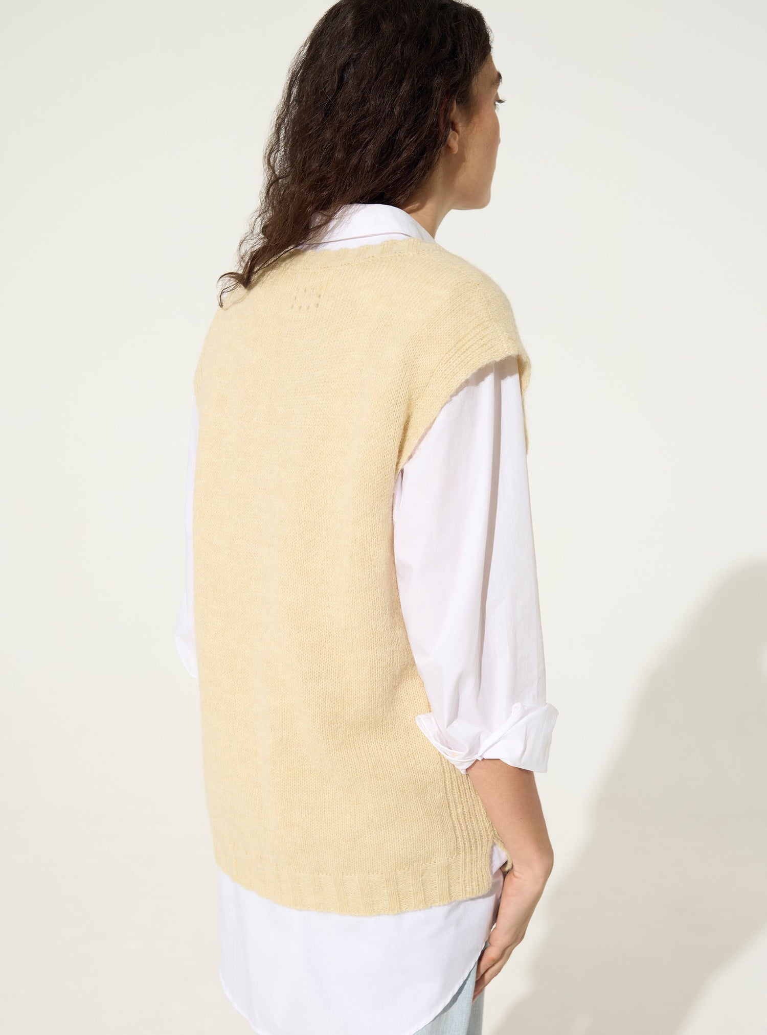 Ecru sleeveless sweater