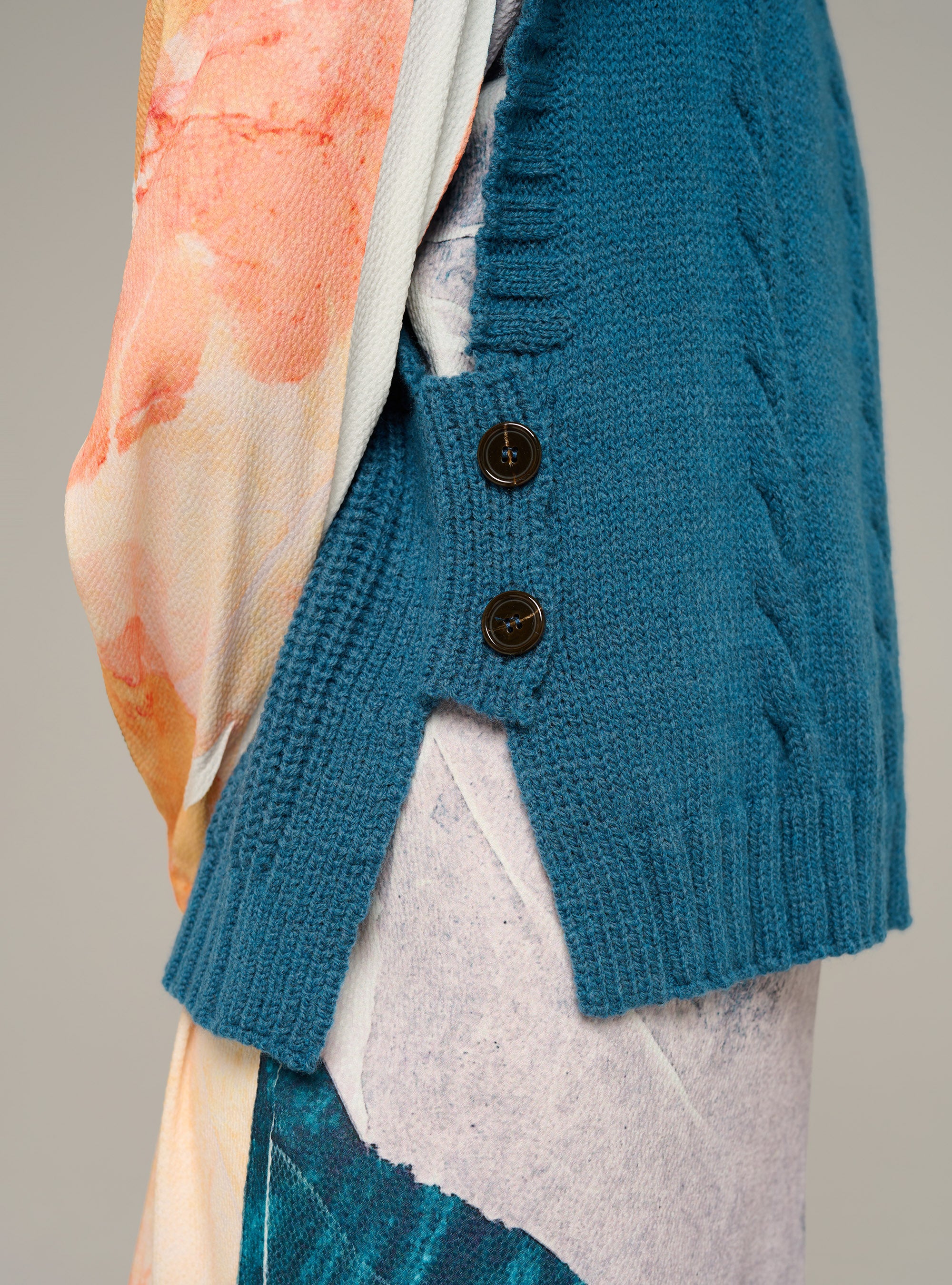 Sleeveless cable-knit sweater