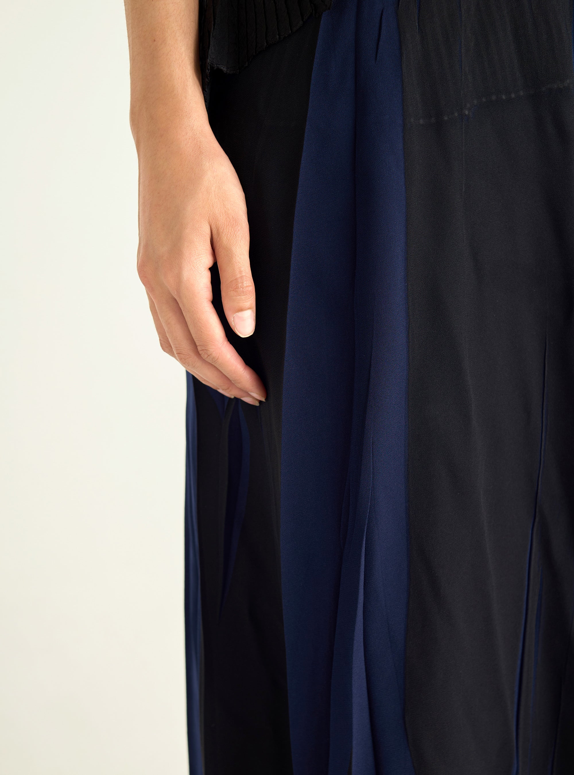 Dress with pleated ruffles and flowing material