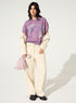 Pleated and sublimated purple round-neck sweater