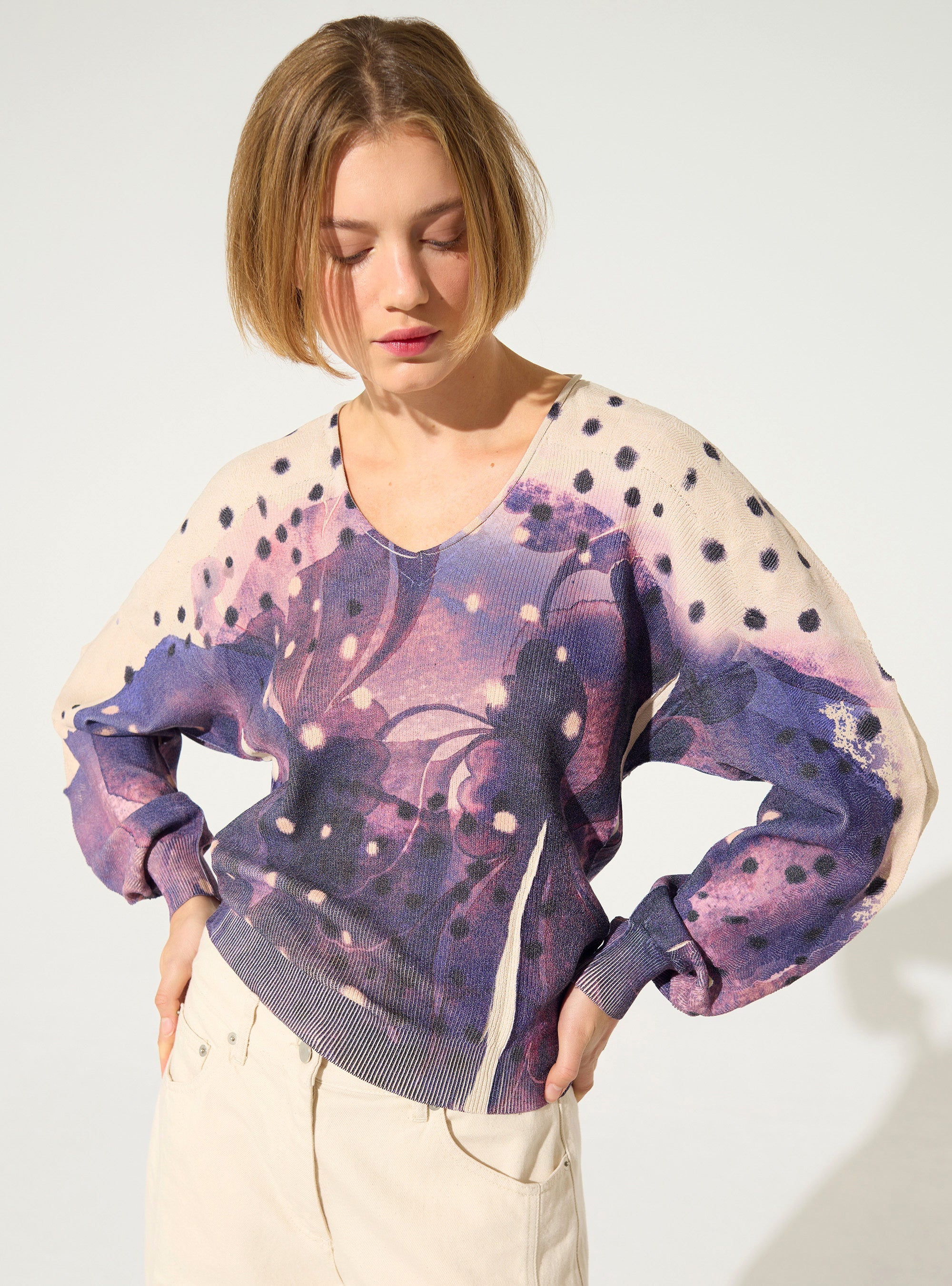 Pleated and sublimated purple v-neck sweater