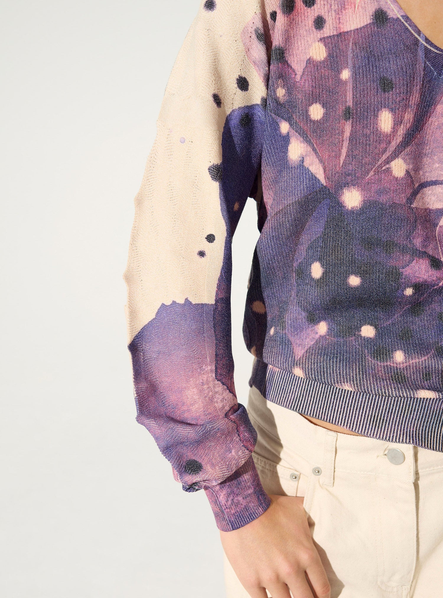 Pleated and sublimated purple v-neck sweater