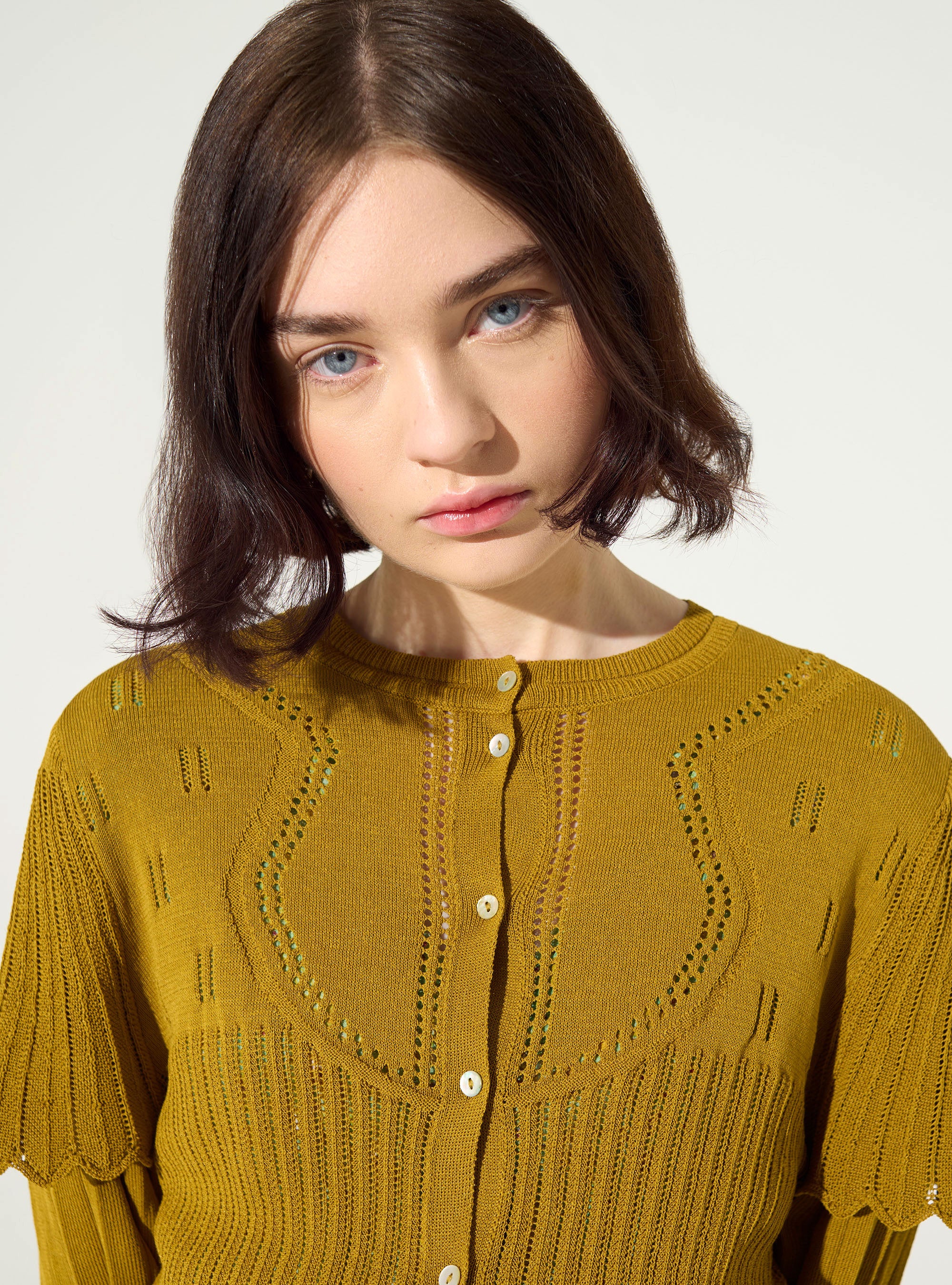 Yellow pleated cardigan