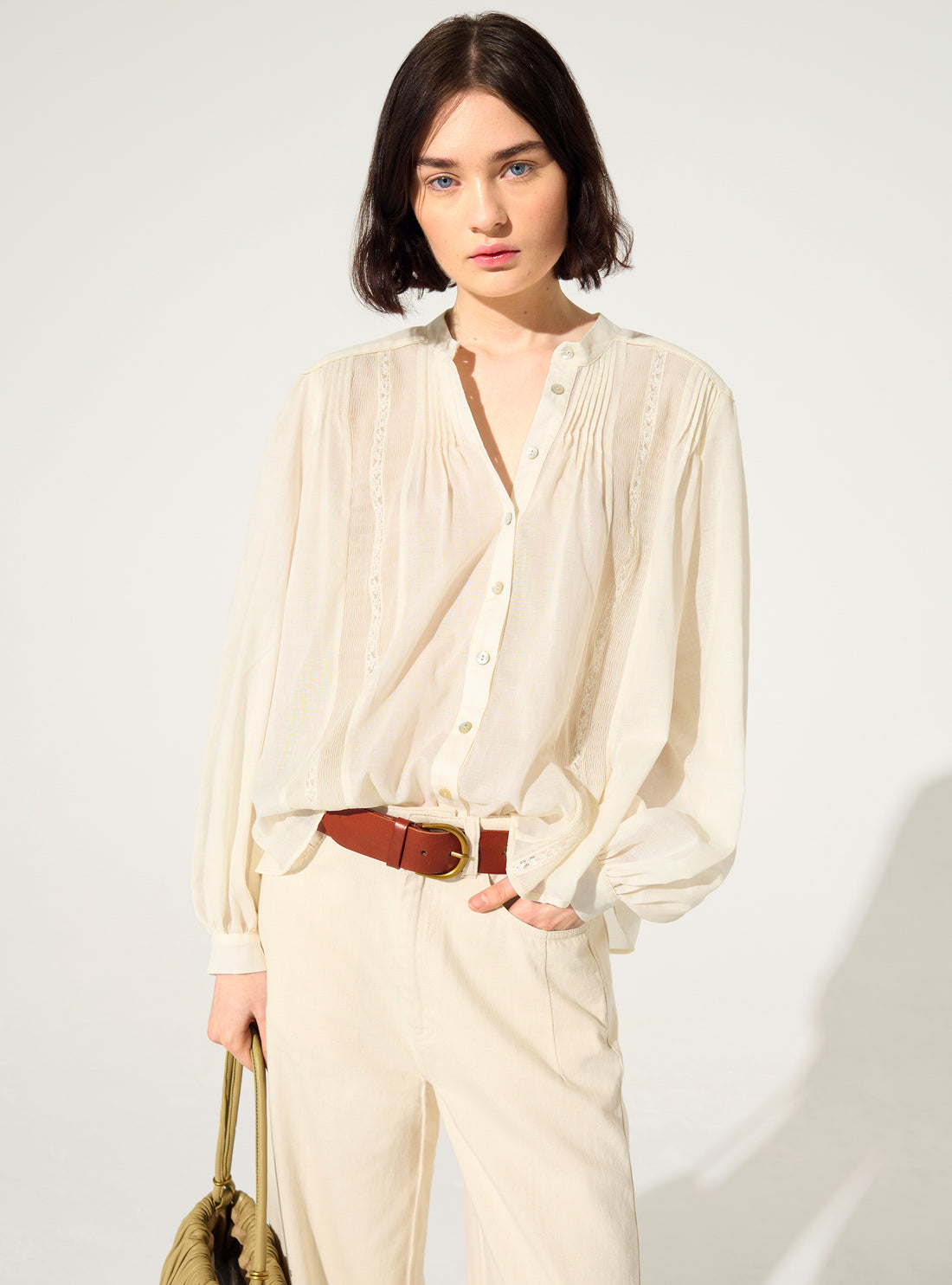 White oversized pleated shirt with authentical Calais-Caudry® lace