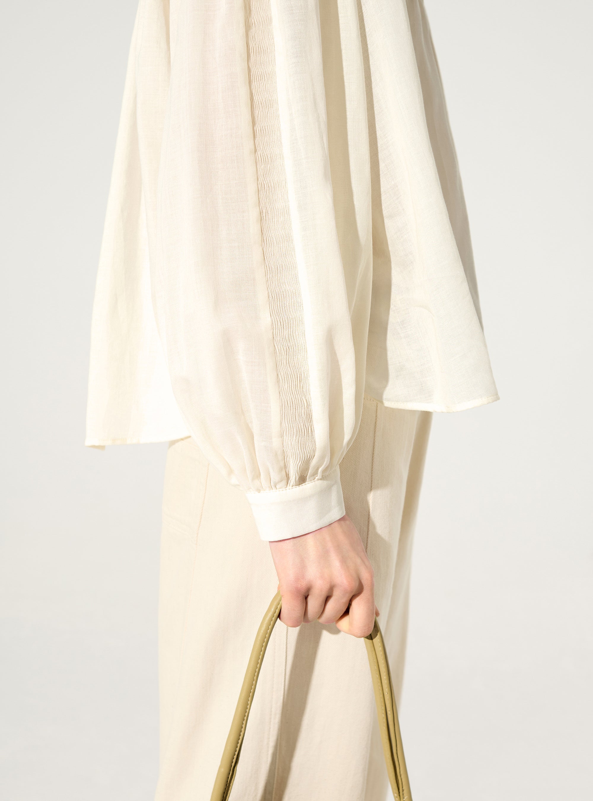 White oversized pleated shirt with authentical Calais-Caudry® lace
