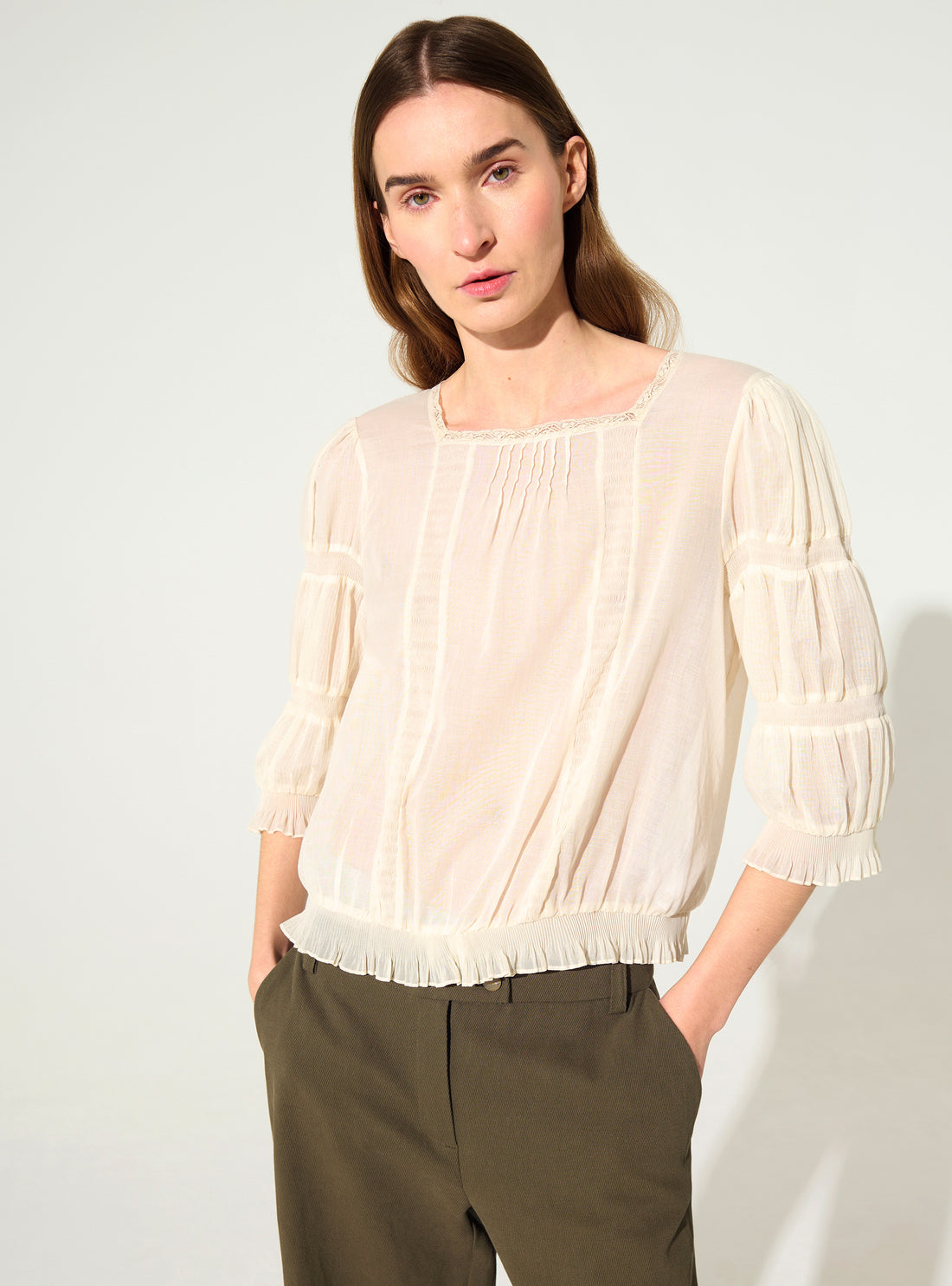 Pleated blouse and ecru Calais-Caudry® lace