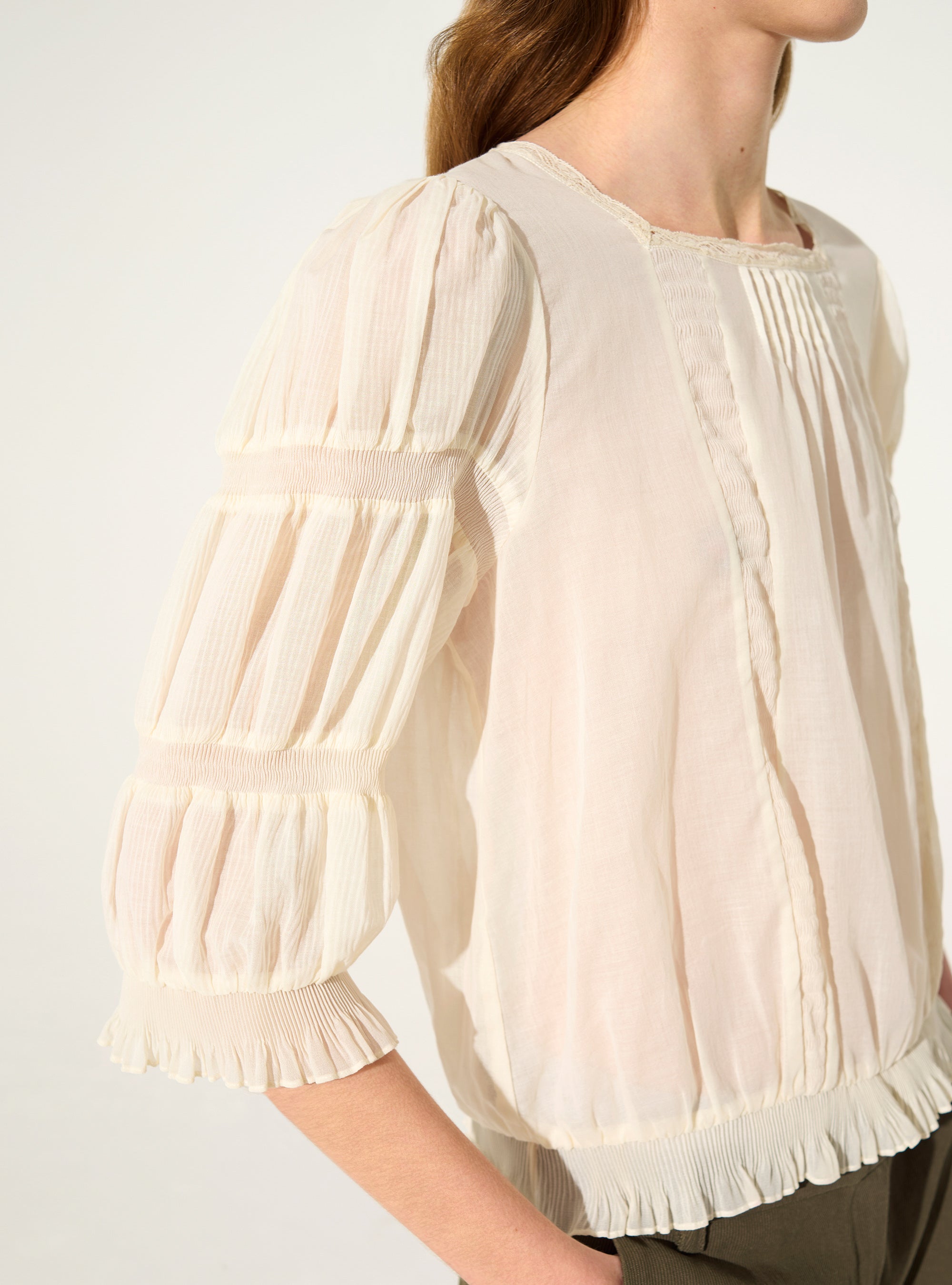 Pleated blouse and ecru Calais-Caudry® lace