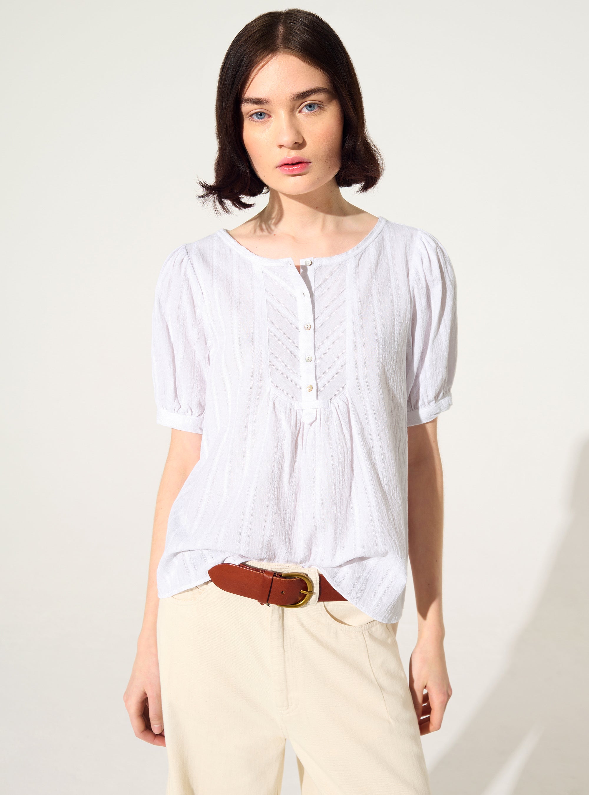 Loose white cotton blouse