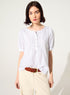 Loose white cotton blouse