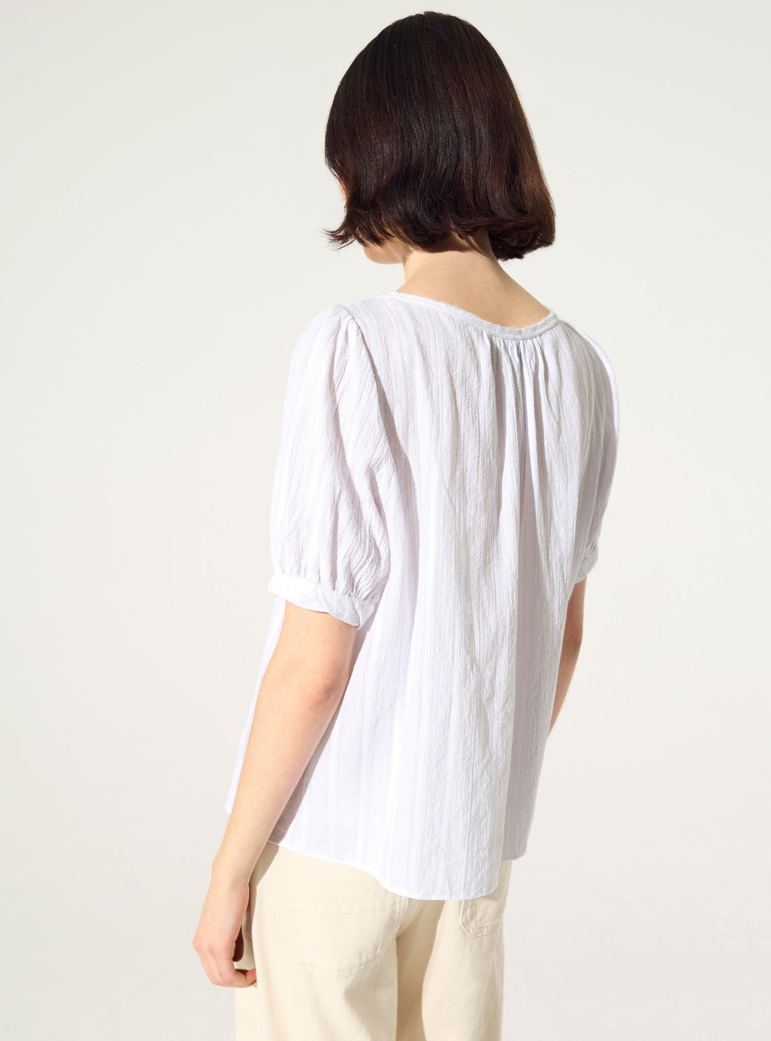 Loose white cotton blouse