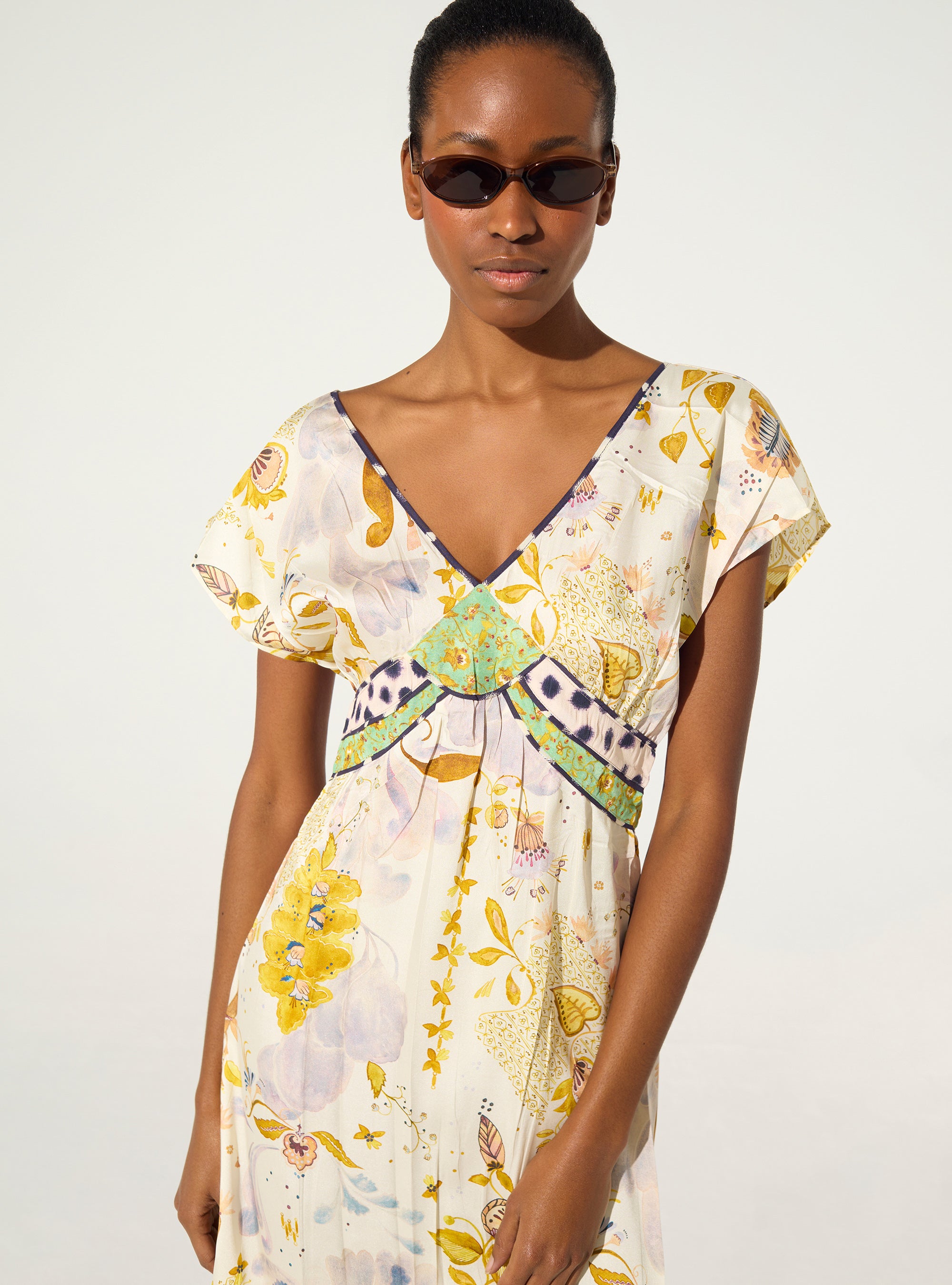 Fitted pleated printed dress