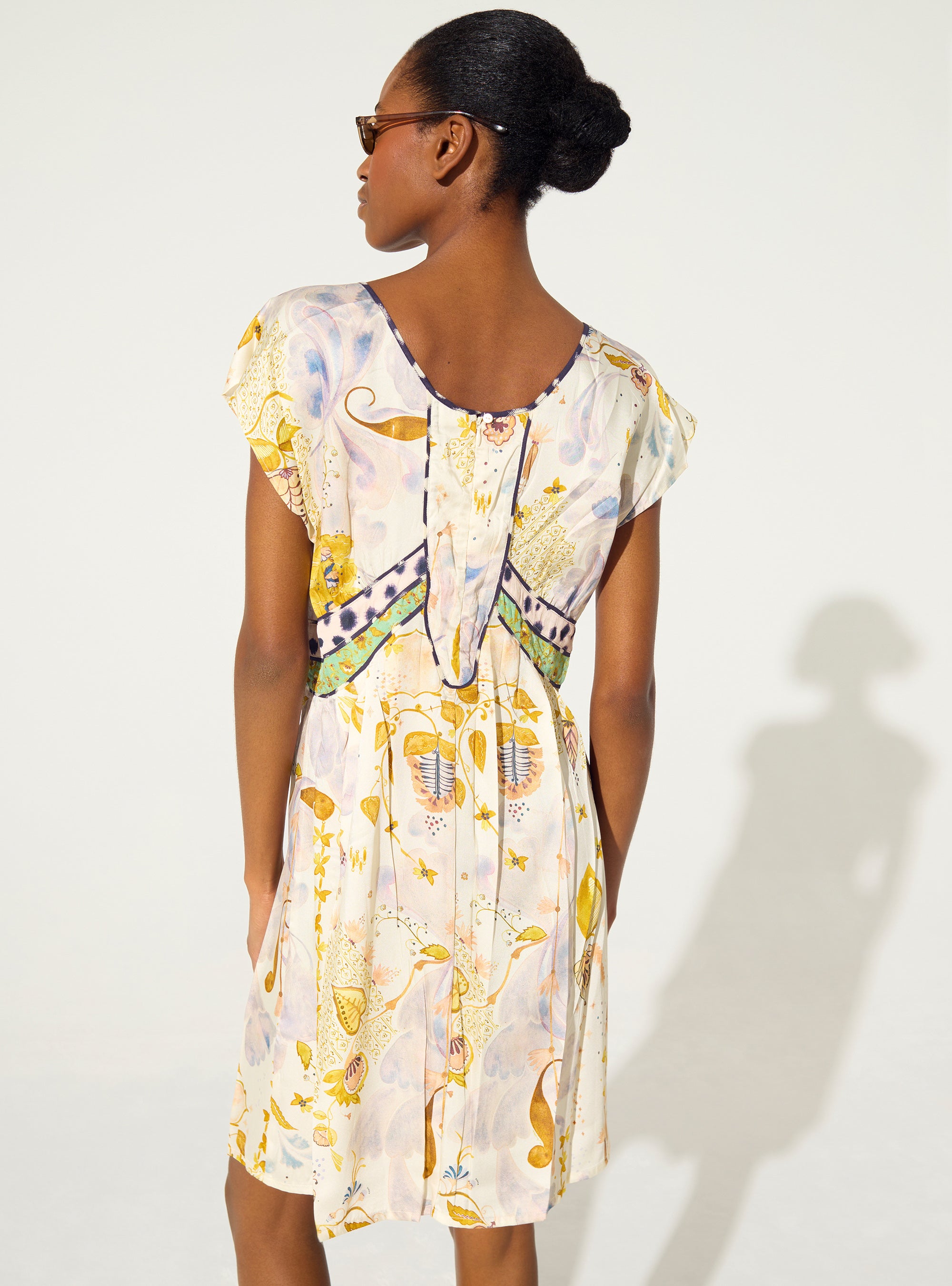 Fitted pleated printed dress