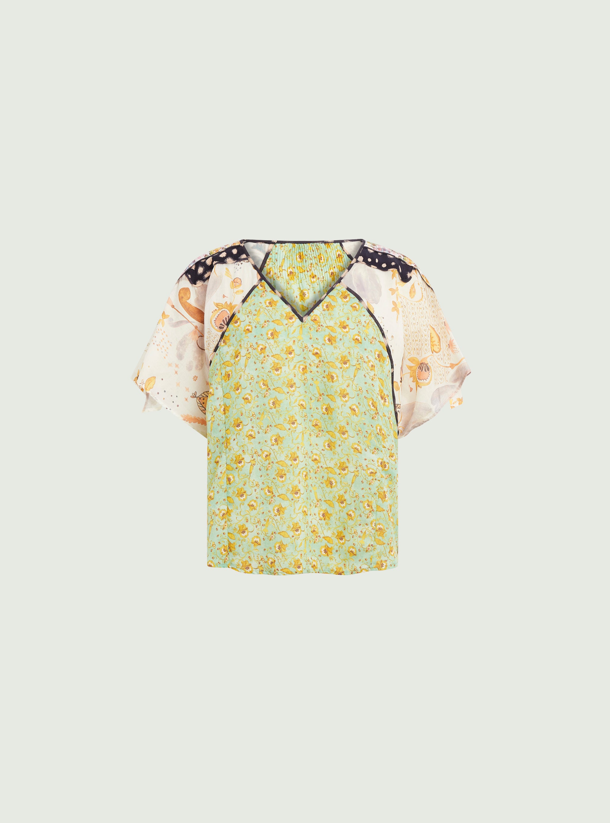 Oversized pleated blouse with green print
