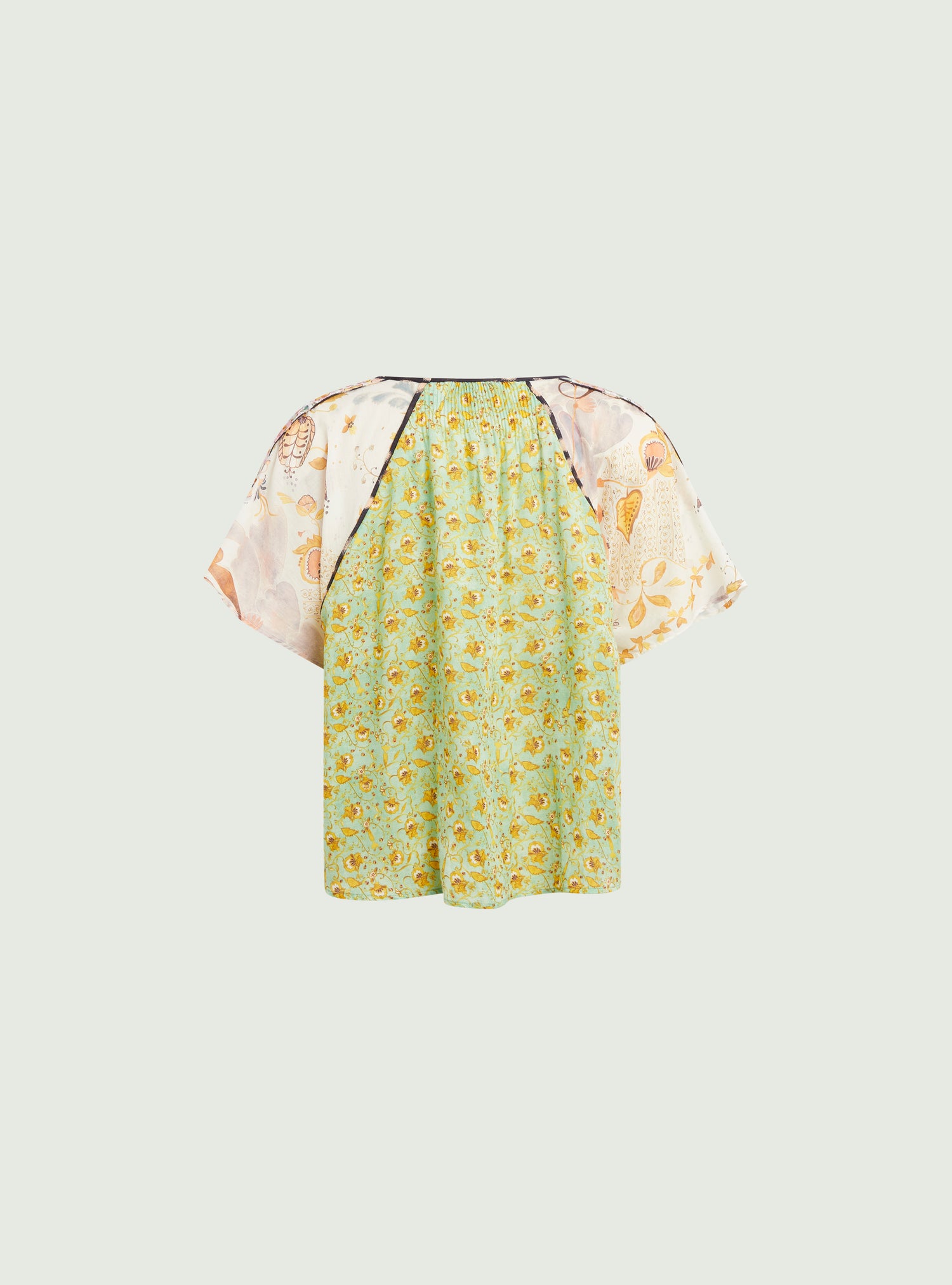 Oversized pleated blouse with green print