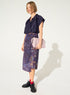 Purple house print pleated midi skirt