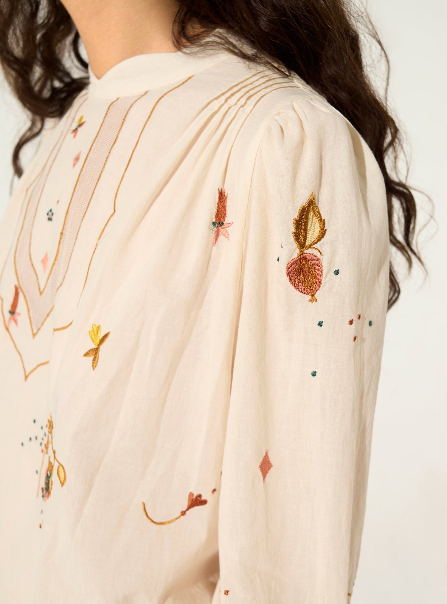 Embroidered blouse in ecru cotton