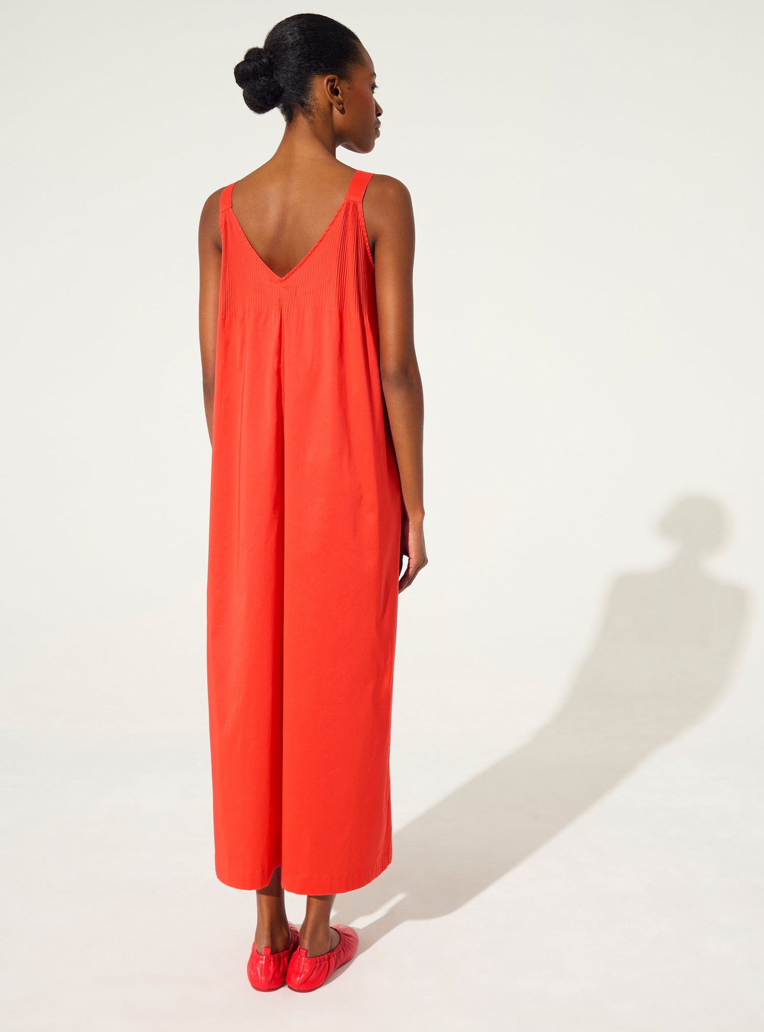 Long pleated dress in red cotton